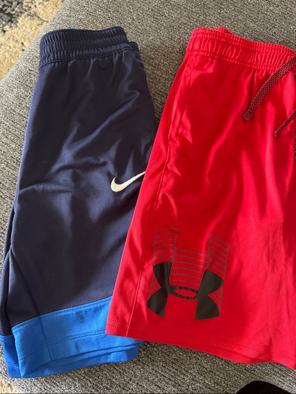 Under Armour Red Boys' Athletic Shorts and Nike black and blue shorts